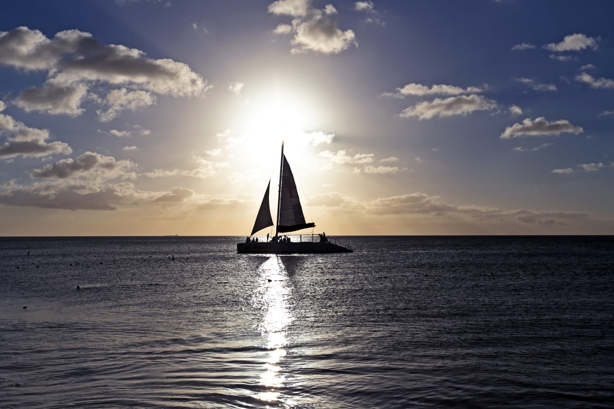 Plan a Romantic Adventure as You Cruise the Eastern Caribbean - Sailing in the Caribbean at Sunset