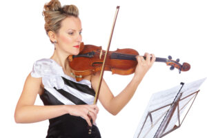 Discover a New Hobby on a River Cruise - Woman Playing Classical Music on a Violin